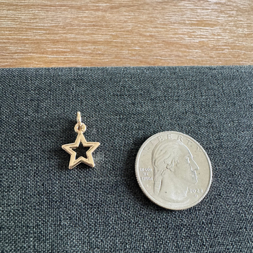 Saint Open Star Charm Golden