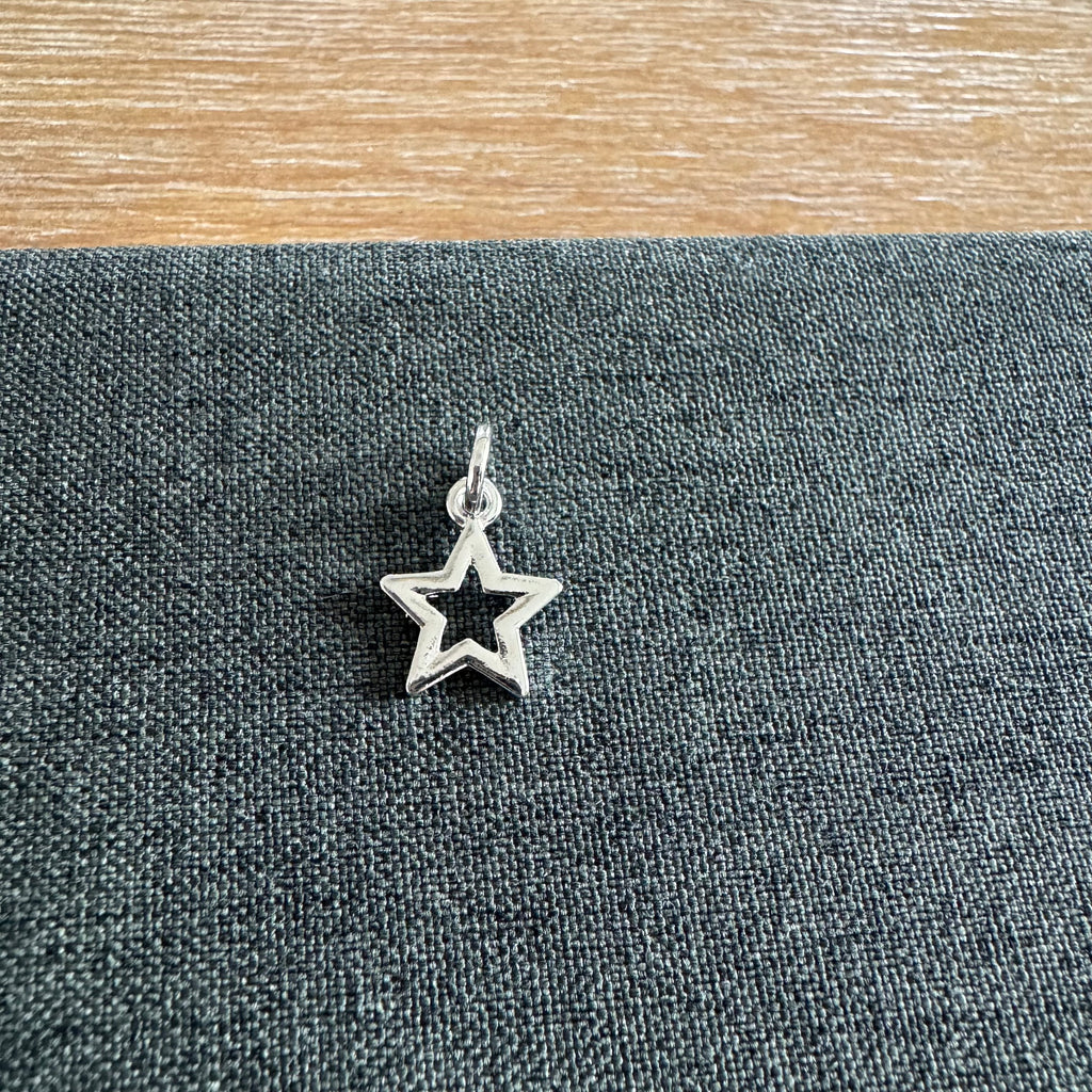 Saint Open Star Charm