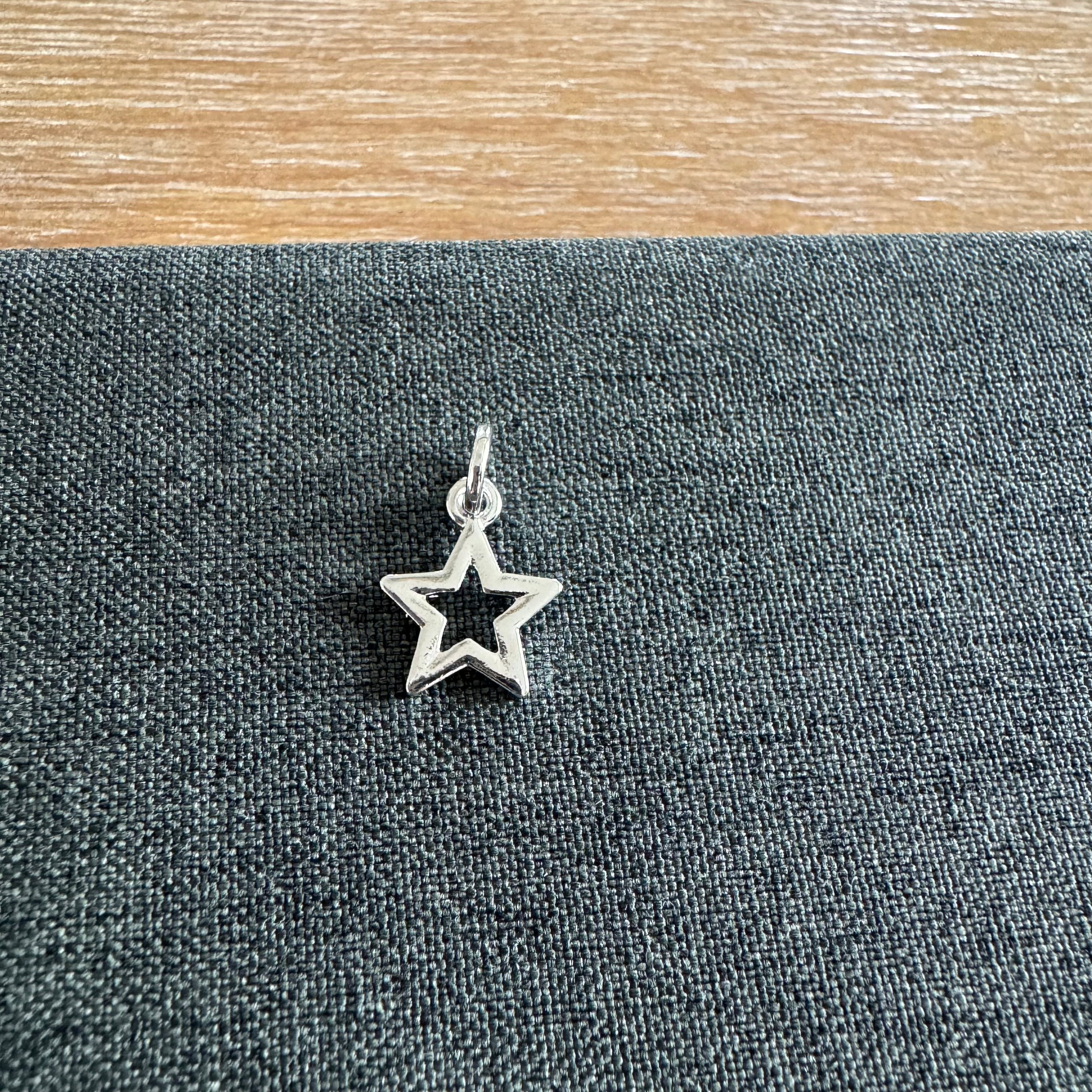 Saint Open Star Charm